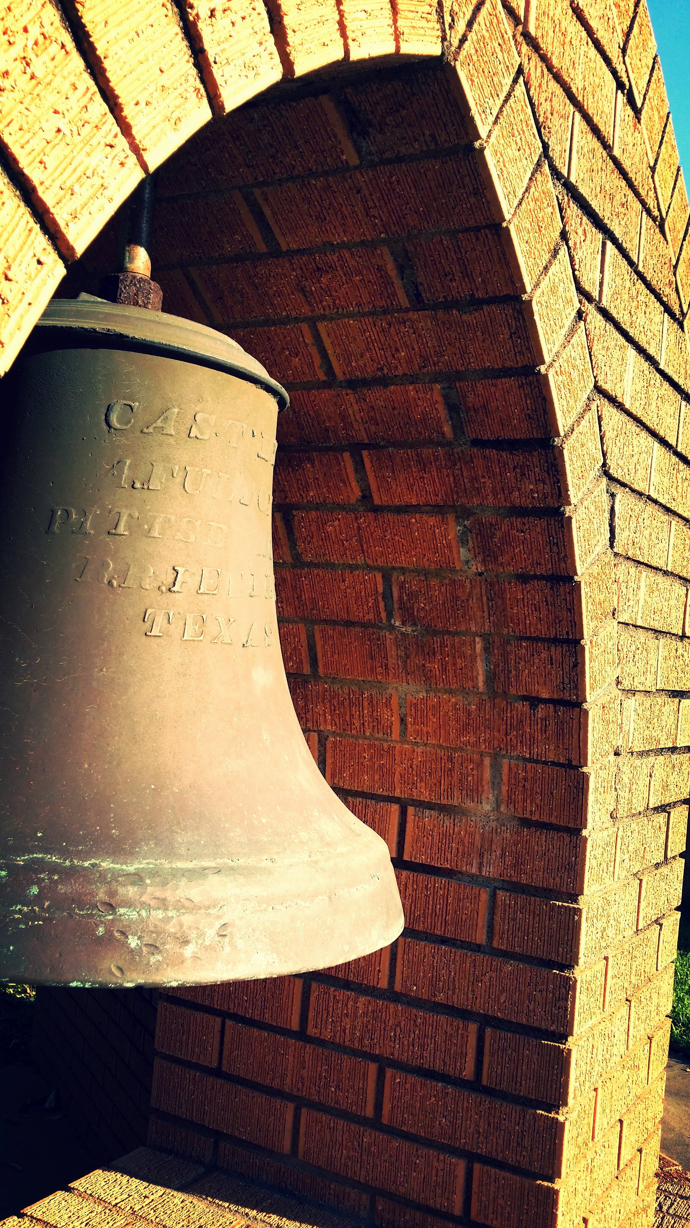 Bell in front of St. Bart's Hempstead